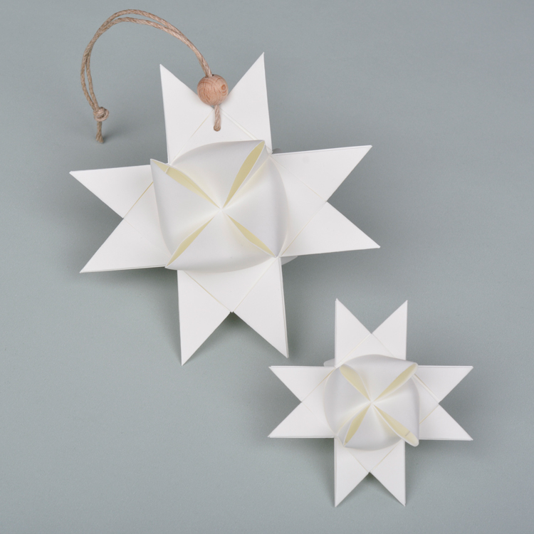 Use paper strip cut from an A4 paper to fold Origami Star